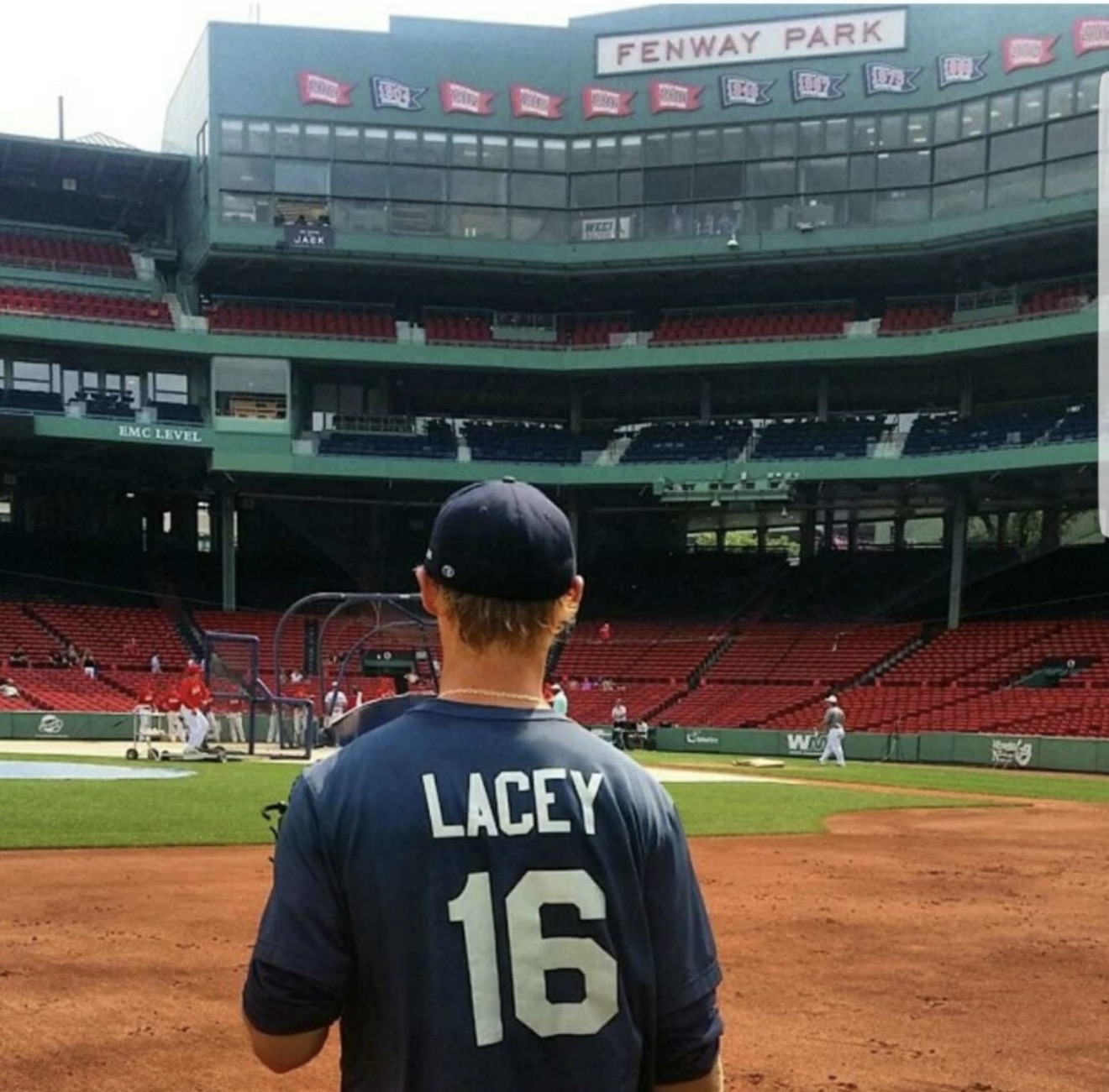 Blake Lacey, number 16, on the field at Fenway Park